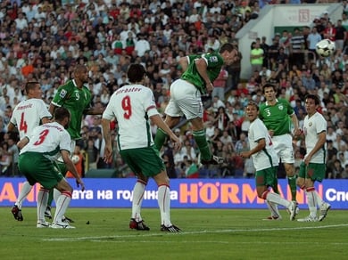 Richard Dunne rises unchallehned to give Ireland the lead in Sofia.