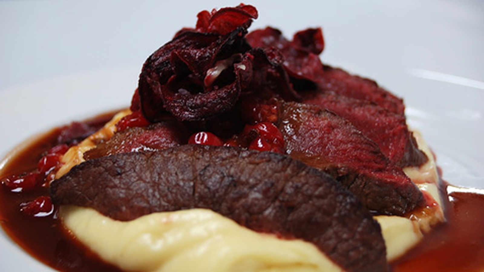 Seared Loin of Venison with Redcurrant Jus, Parsni