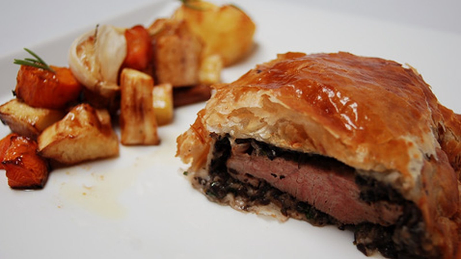 Lamb En Croute, Roasted Root Vegetables with Rosem