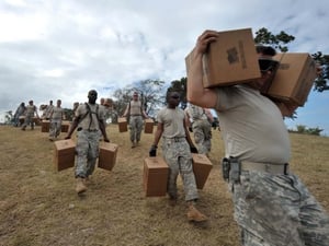 US marines carry aid ashore near Port-au-Prince