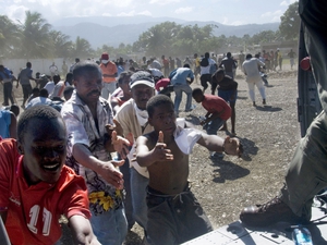 Aid arriving by helicopter in Port-au-Prince.