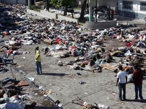 Haitians look for survivors among the bodies in Port-au-Prince