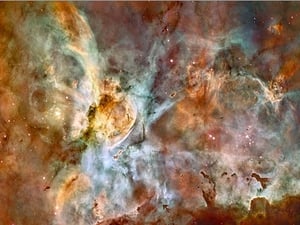 This image is a mosaic of the Carina Nebula assembled from 48 frames. Red corresponds to sulphur, green to hydrogen, and blue to oxygen emission.