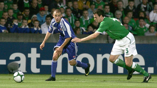 Slovakia's Vladimir Weiss gets past Northern Ireland's Jonathan Evans in a World Cup qualifying clash at Windsor Park