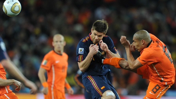 Howard Webb wishes he could have reviewed this Nigel de Jony challenge from the World Cup final in 2010