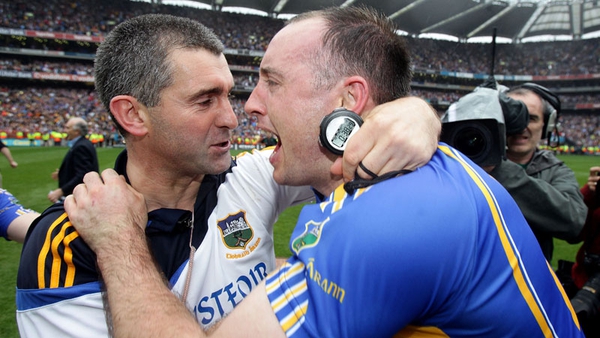 Liam Sheedy (L) celebrates with Tipperary captain Eoin Kelly in 2010