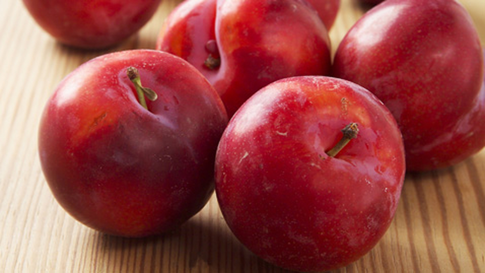 Flambéed Plums, Warm Madeira, Vanilla Crème Fraich