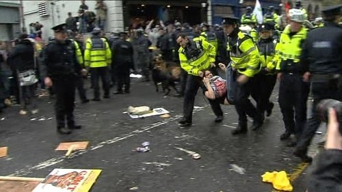 Dublin - Protestor taken away by gardaí