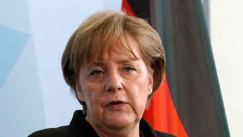 Angela Merkel - She will await reports from EU and IMF officials before deciding on whether to continue funding Greece.