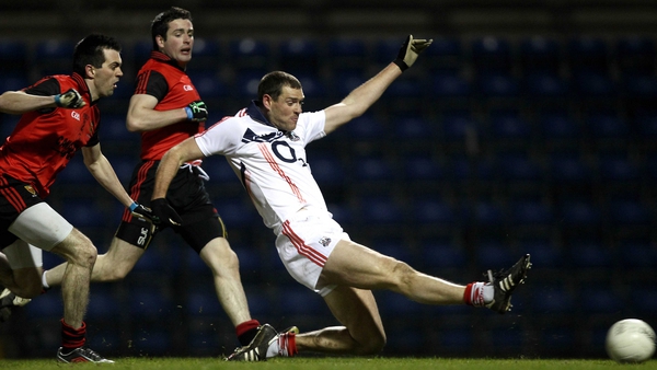 Pearse O'Neill scores an early goal for Cork against Down