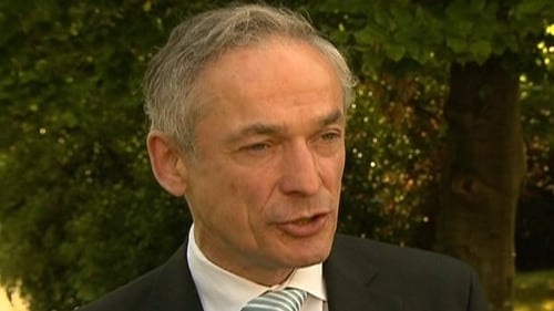 Richard Bruton is attending the signing of the agreement