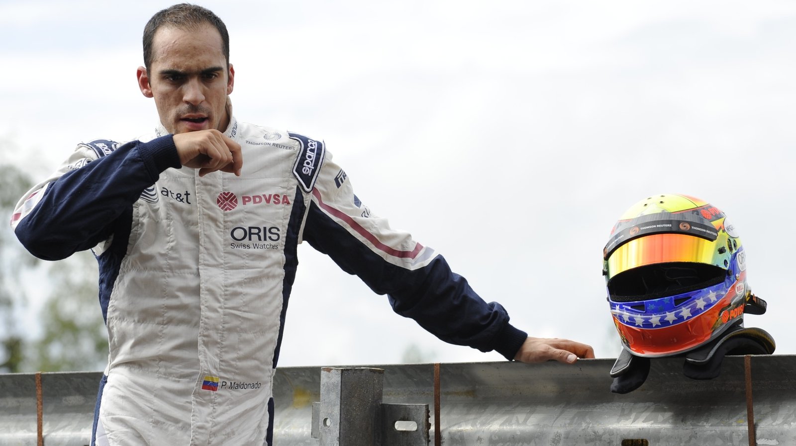 Rubens Barrichello talks to Williams team-mate Pastor Maldonado