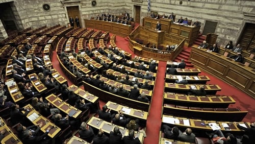 Greece's new coalition government has secured enough parliamentary votes early to pass a 2012 budget