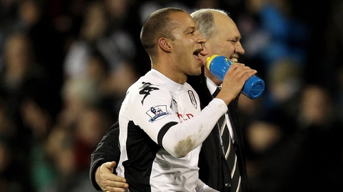 Bobby Zamora is congratulated by Fulham boss Martin Jol after the final whistle at Craven Cottage