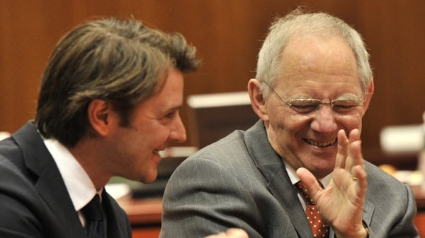 Wolfgang Schauble (right) says finance industry tax exemption not justified