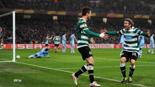 Sporting Lisbon's Diego Capel (right) celebrates with goalscorer Ricky van Wolfswinkel (left)