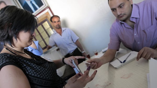 Ban slams Syria for holding a national election despite ongoing violence
