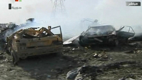 Syrian state TV reported 55 dead in Damascus bombings