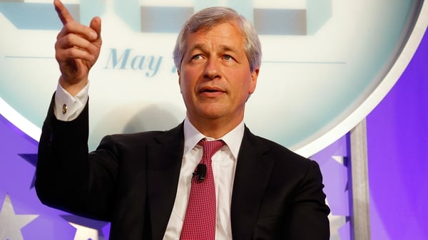 JPMorgan chief executive Jamie Dimon reported his first quarterly loss as CEO because of multi-billion dollar bills