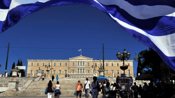 Greek parliament earlier approved a series of unpopular tax rises to increase government income