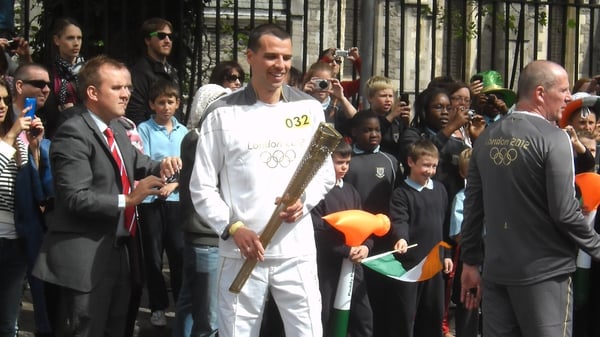 Mark Kenneally with the Olympic torch