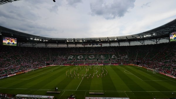 Dancers perform on the field prior to the match between the Czech Republic and Poland at the Municipal Stadium in Wroclaw