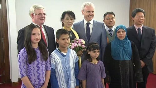 Aung San Suu Kyi was presented with flowers by Burmese-Ireland children