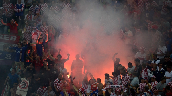 Croatia fans set off a flare during their game with Spain in Gdansk