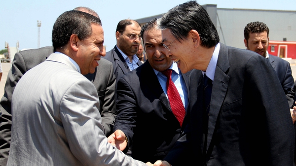 ICC President Sang-Hyun Song met with Libya's justice minister to discuss the team's release