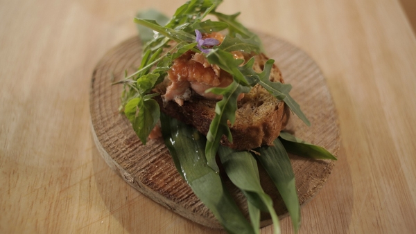 Martin Shanahan's Grilled Sea Trout served on Artisan Bread on a Bed of Wild Mixed Leaves