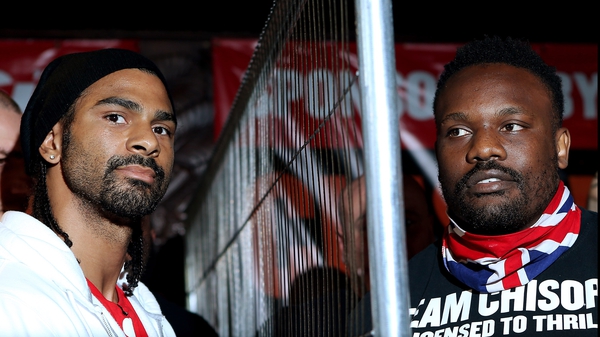 David Haye (l) and Dereck Chisora were separated by a steel fence in Camden