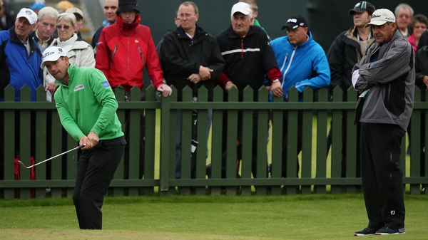 Padraig Harrington practising yesterday at Royal Lytham as advisor Bob Rotella looks on