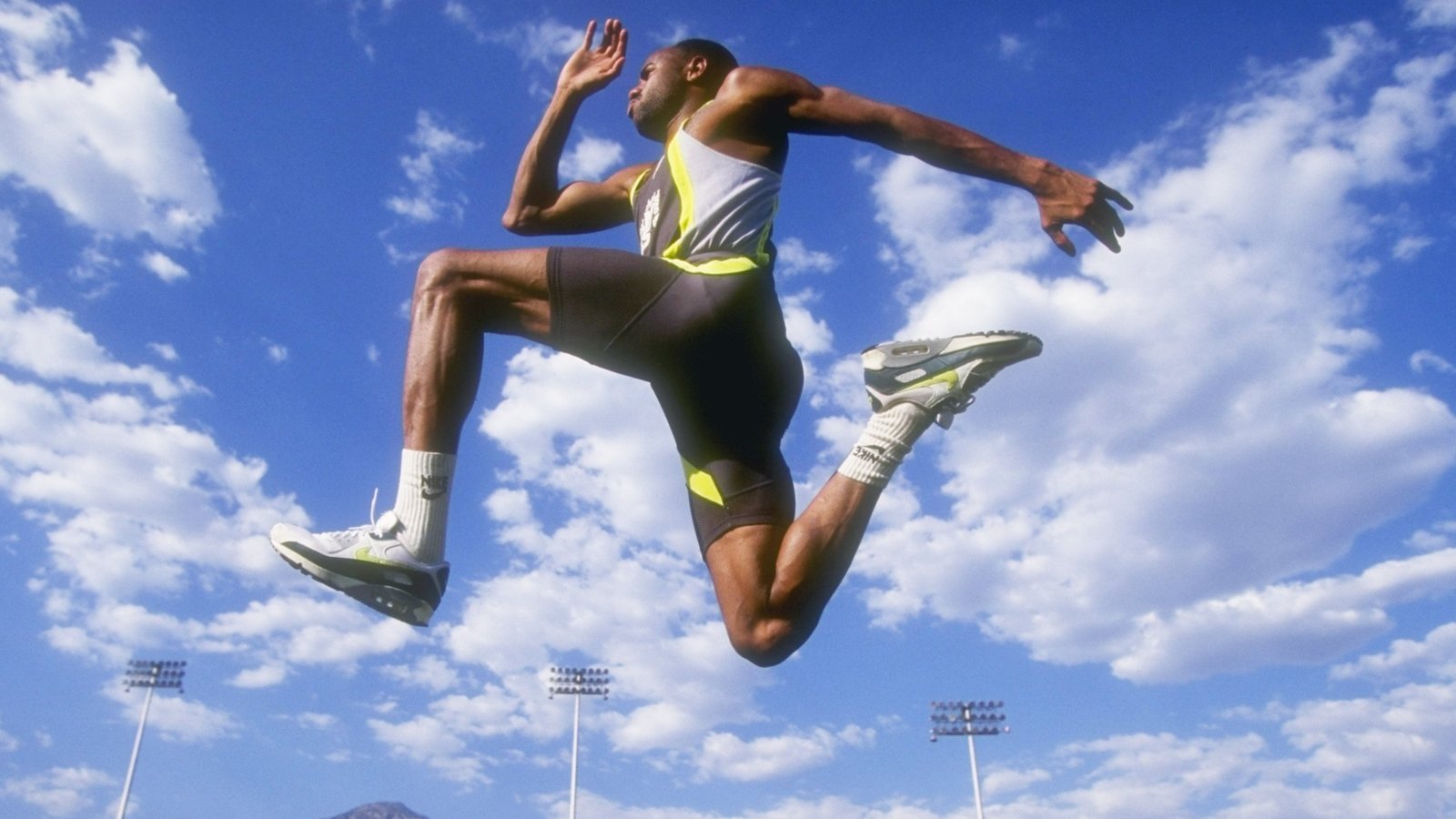 Long jumping for gold means aiming high