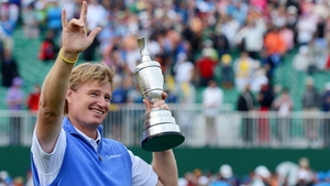 Els holds the Claret Jug after his stunning success at Royal Lytham and St Annes