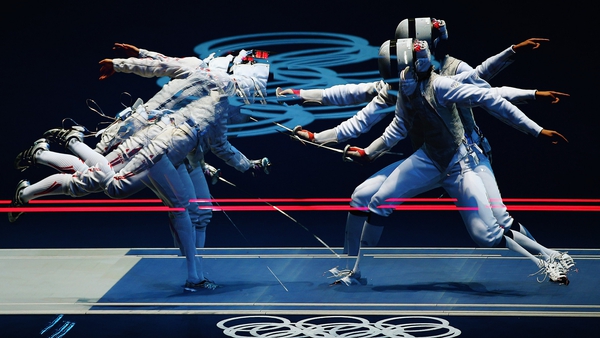 Carolin Golubytskyi of Germany competes against Elisa Di Francisca of Italy in their Women's Foil Individual Fencing round of 16 match