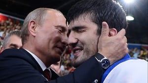 Vladimir Putin enthusiastically congratulates Tagir Khaybulaev