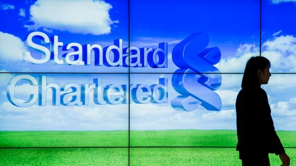 Standard Chartered's first quarter pre-tax profits fell by 12% from the same period a year earlier to $1.22 billion