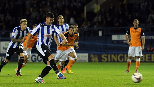 Gary Madine of Sheffield Wednesday scores the penalty that beat Fulham