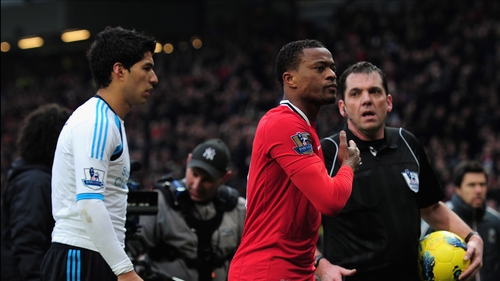 Luis Suarez (l) and Patrice Evra (c) are not exactly on the best of terms