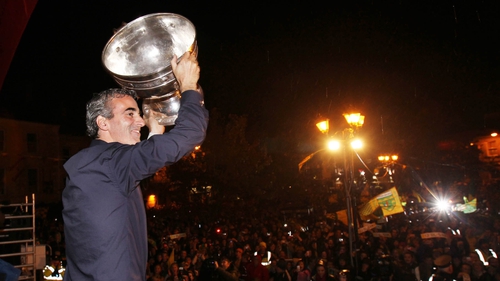 Jim McGuinness carries the Sam Maguire last night