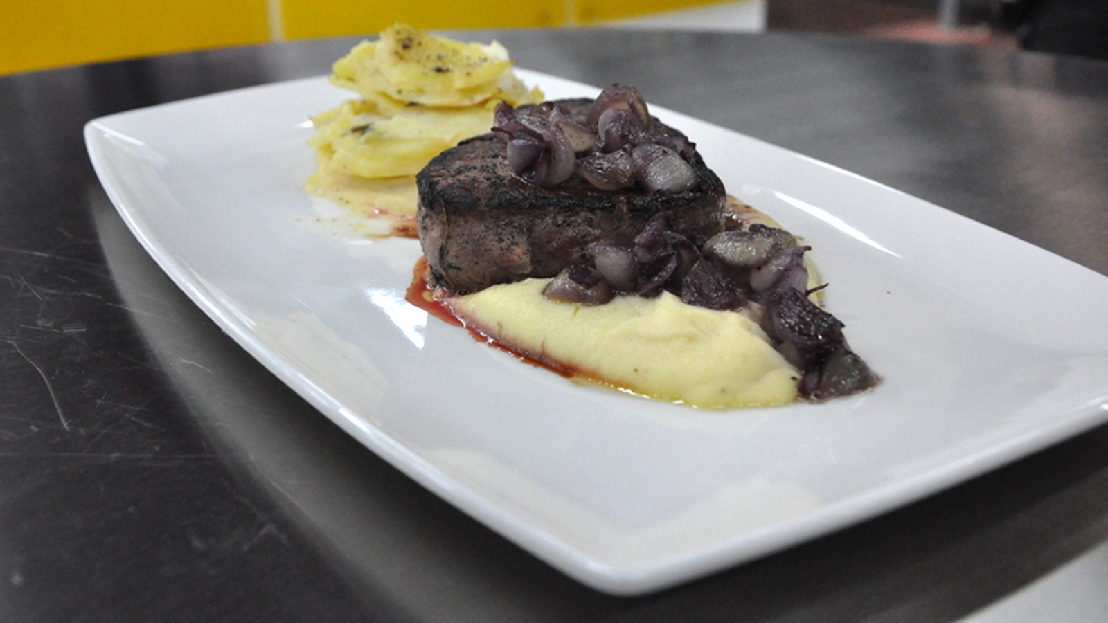Steak, celeriac mash and red wine onions