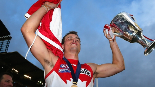 Mike Pyke of the Swans celebrates after the game