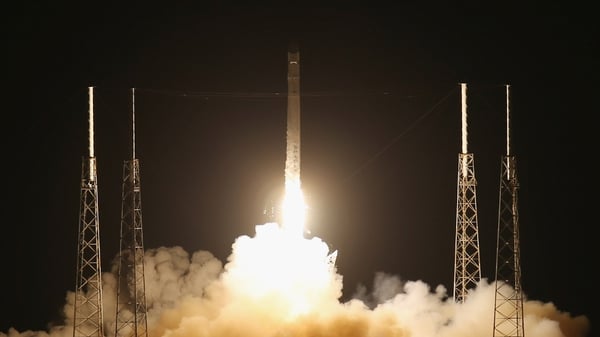 The SpaceX Falcon 9 rocket attached to the cargo-only capsule called Dragon lifts off from the launch pad