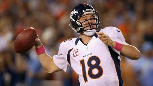 Quarterback Peyton Manning of the Denver Broncos drops back to pass against the San Diego Chargers