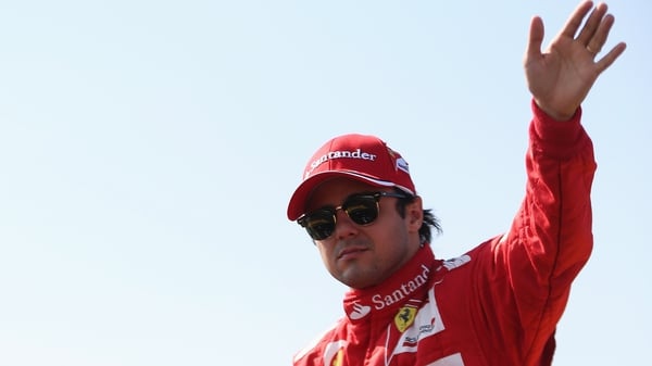 Felipe Massa will be waving from the track to the adoring Ferrari tifosi until 2013 - at least