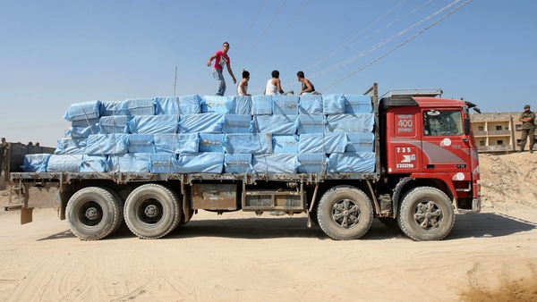 A Palestinian truck carrying goods smuggled through tunnels leaves the Gaza-Egypt border in Rafah in the southern Gaza