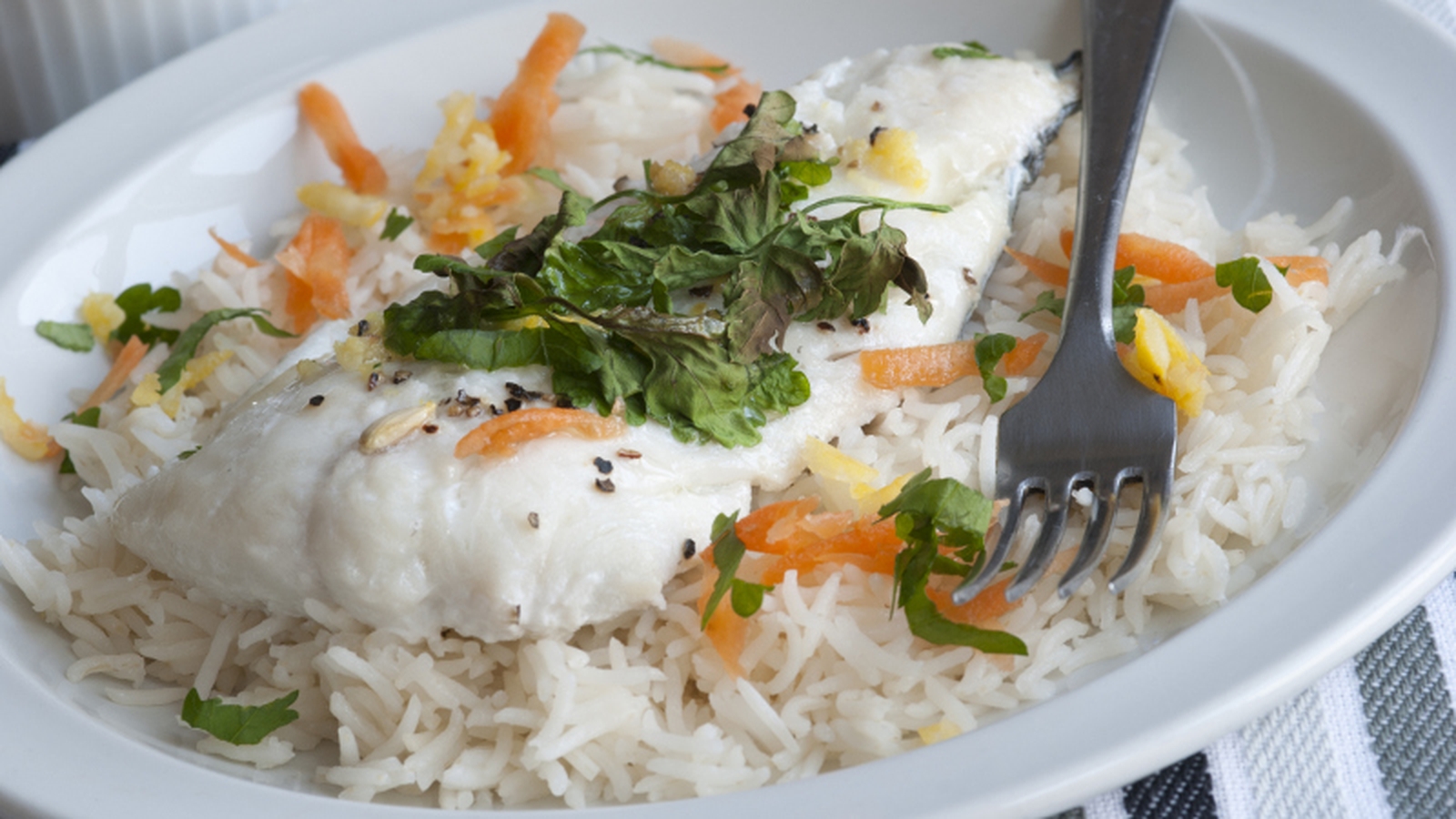 Poached Haddock with spiced rice and fennel salad