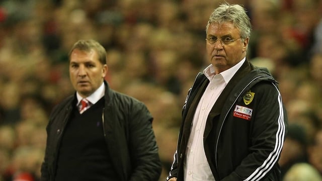 Guus Hiddink with Liverpool manager Brendan Rodgers (left)