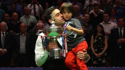 Ronnie O'Sullivan celebrates the World Championship with his son last May