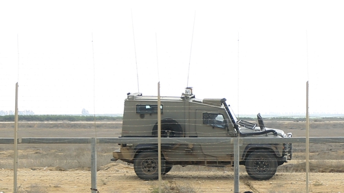 An Israeli military vehicle patrols the border